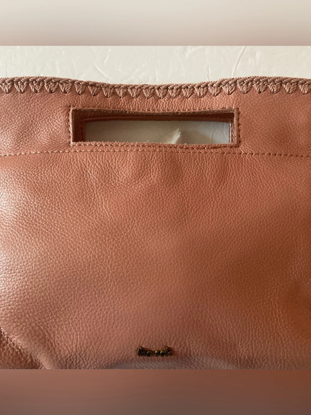 The Sak coral lite pink Leather Cutout-Handle Crossbody Clutch Hand Stitched